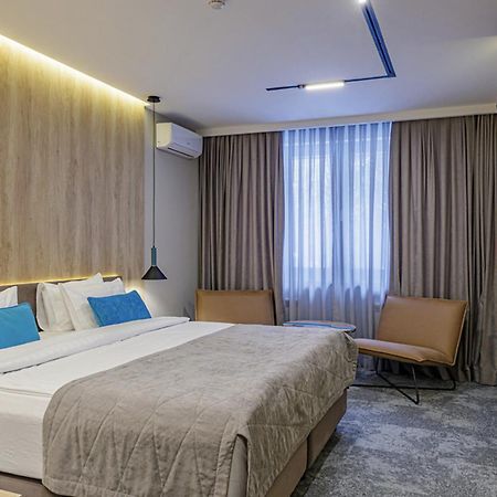 Тау-House Hotel Kok-Shoky Bagian luar foto