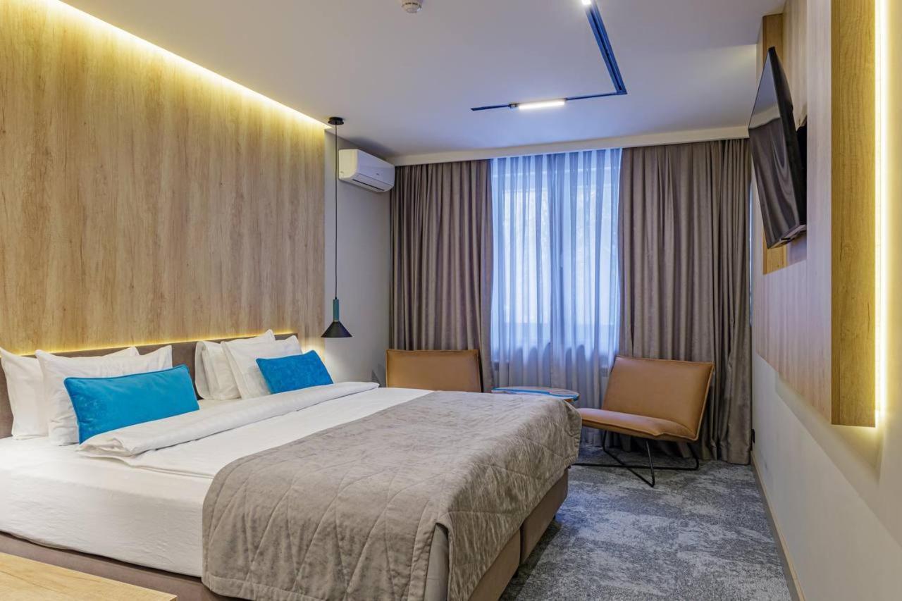 Тау-House Hotel Kok-Shoky Bagian luar foto