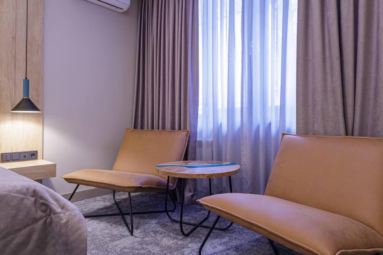 Тау-House Hotel Kok-Shoky Bagian luar foto